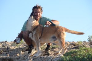 man with rescue dog